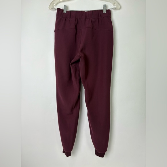 Lululemon On The Fly Jogger Woven Cassis Pant Maroon - Picture 6 of 8